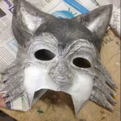 A wolf mask takes shape